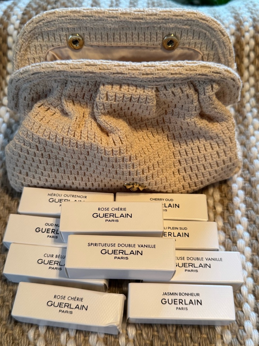 GUERLAIN white and beige sample gift set with woven beige clutch